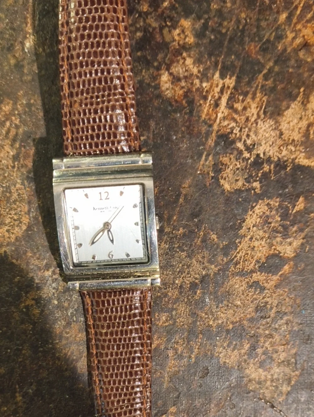 Kenneth Cole New York Ladies Silver Case Watch with Brown Lizard Style Band Cool